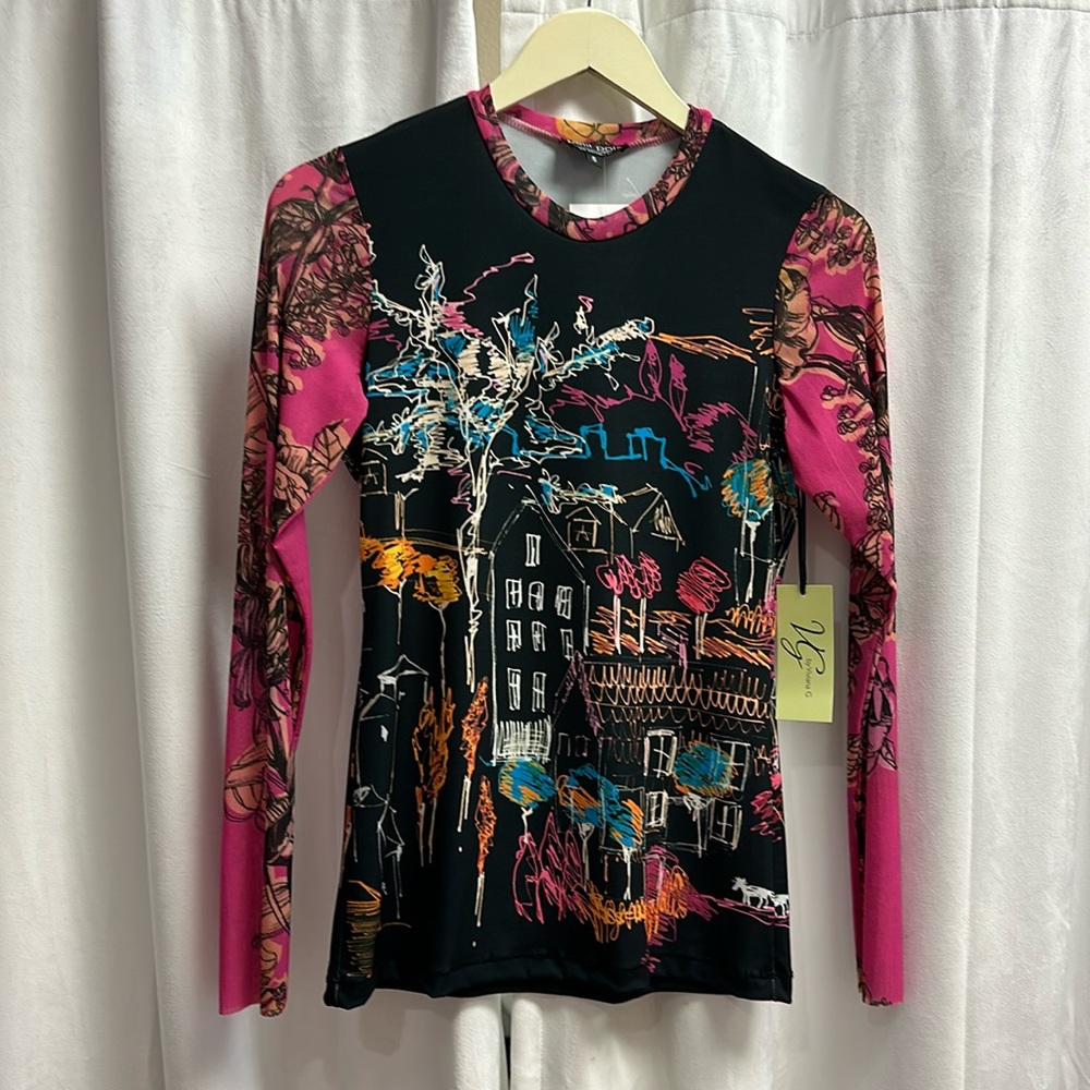 Beautiful light weight long sleeve top by petit Pois